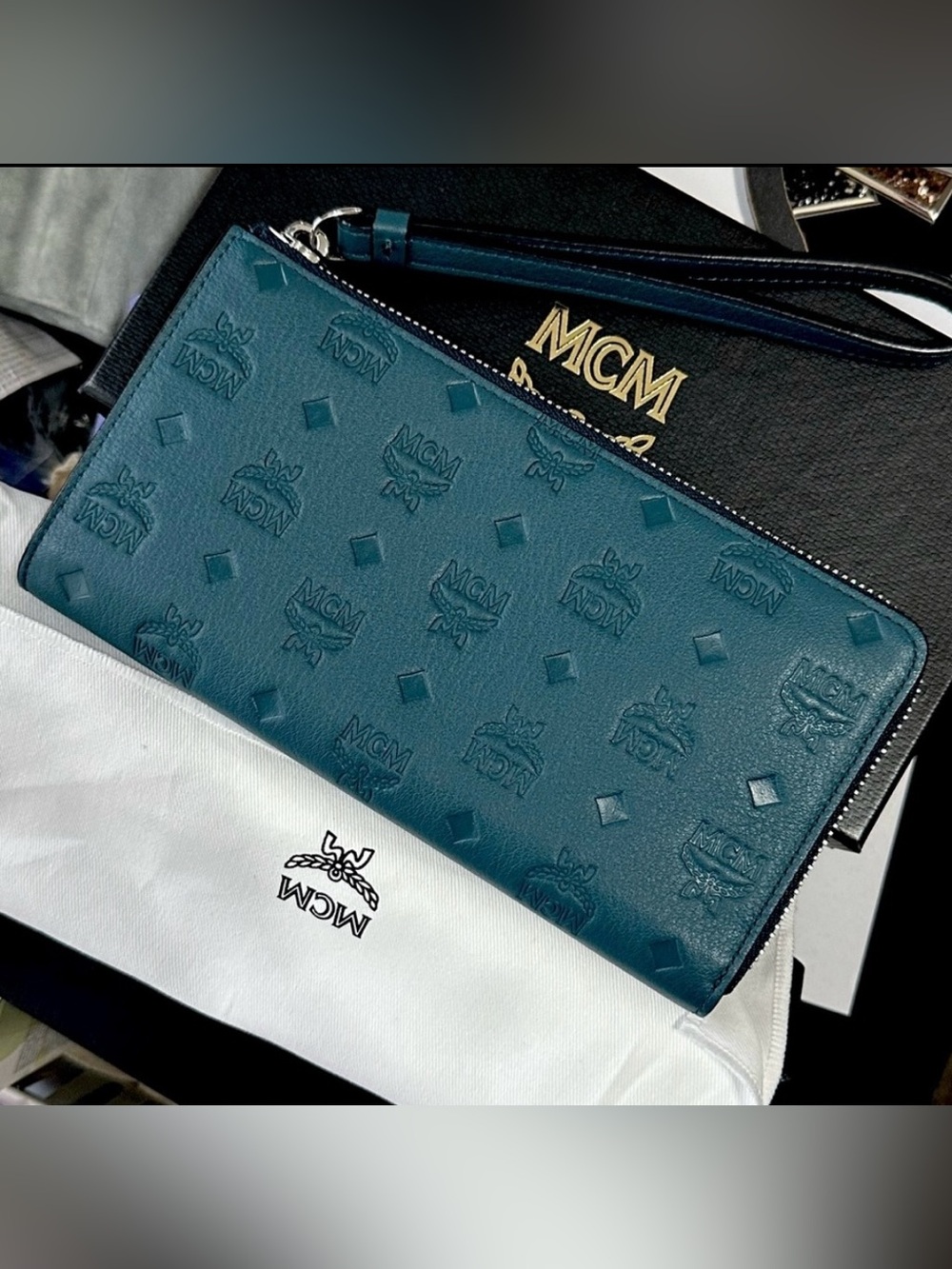 Authentic MCM Teal Leather Zip Clutch Wallet wrist strap, with dust bag and box